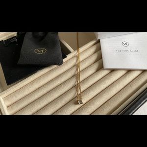 Mejuri Emerald Cut white sapphire necklace